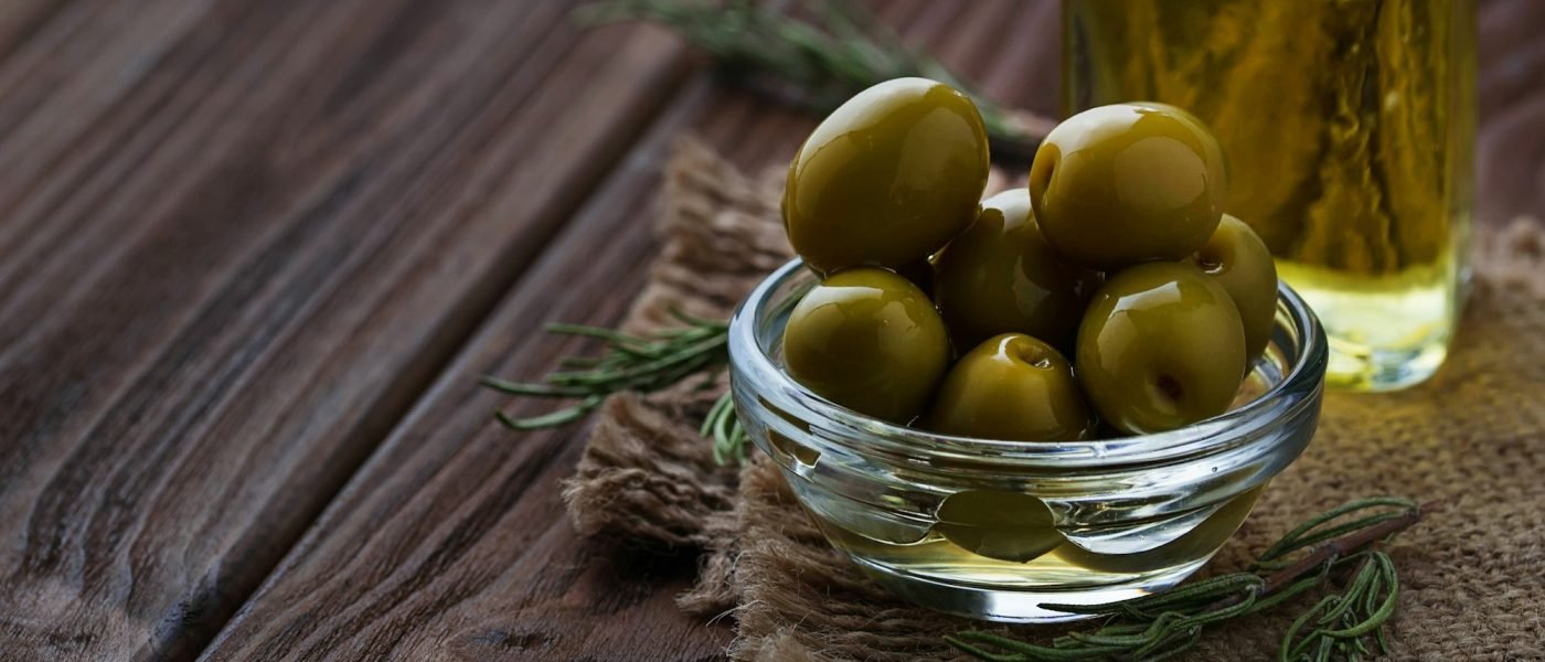 Olives and bottle of olive oil